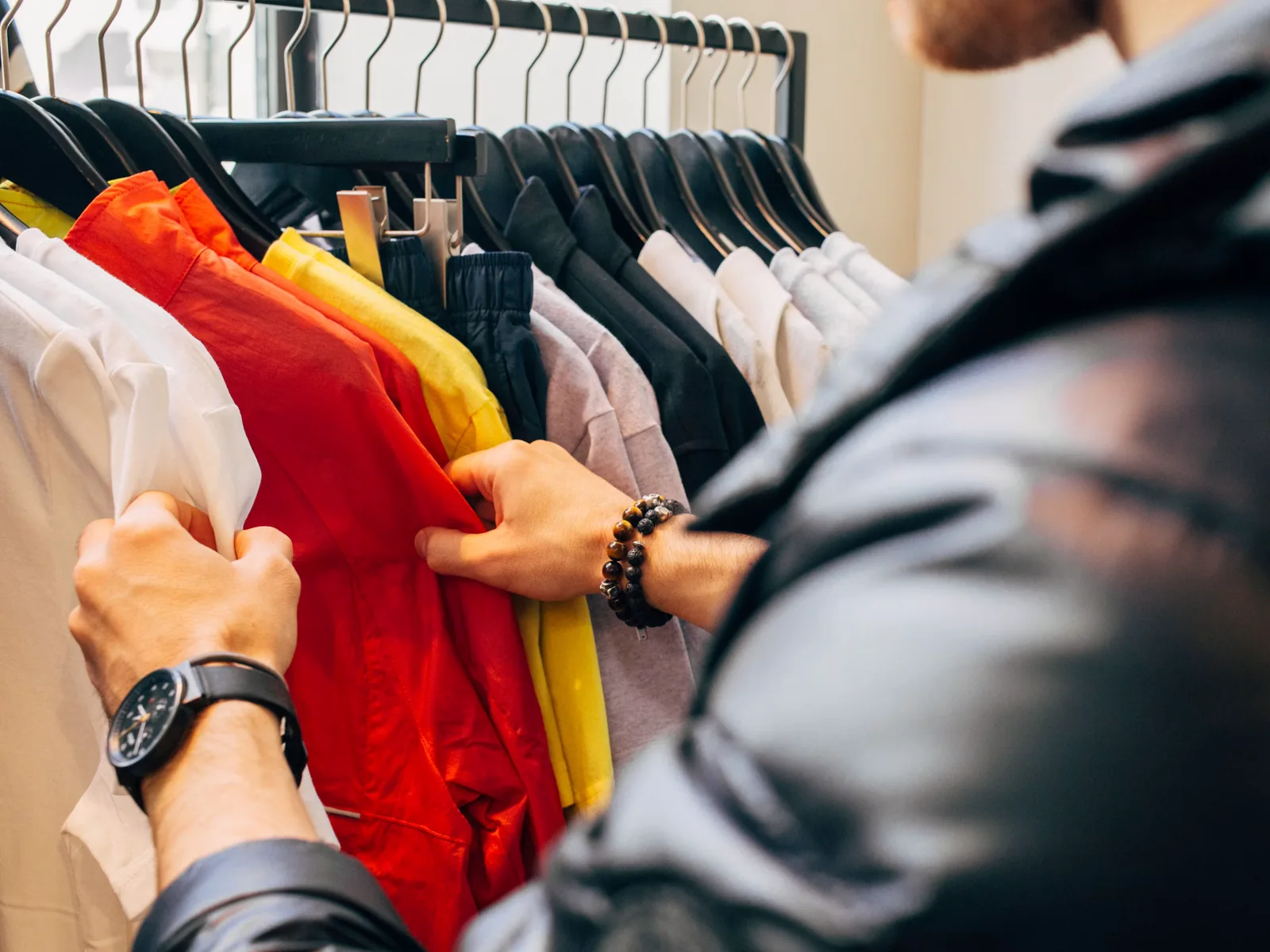 A shopper browsing the rack